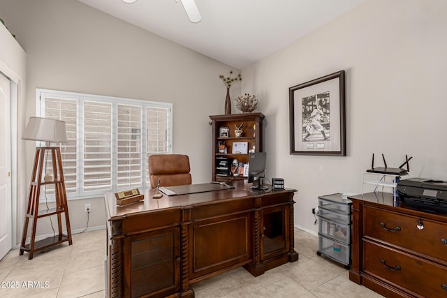 home office featuring ceiling fan, baseboards, and light tile patterned floors