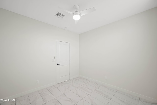 spare room featuring ceiling fan