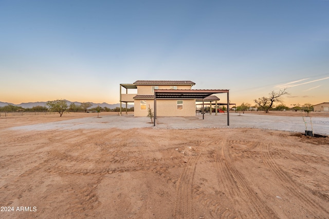 view of front of home with a mountain view