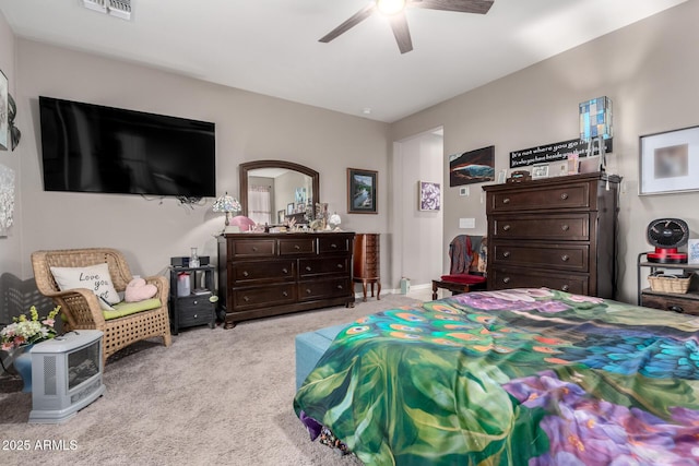 bedroom featuring ceiling fan and light colored carpet