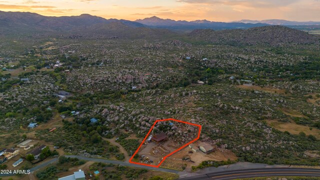 aerial view at dusk with a mountain view