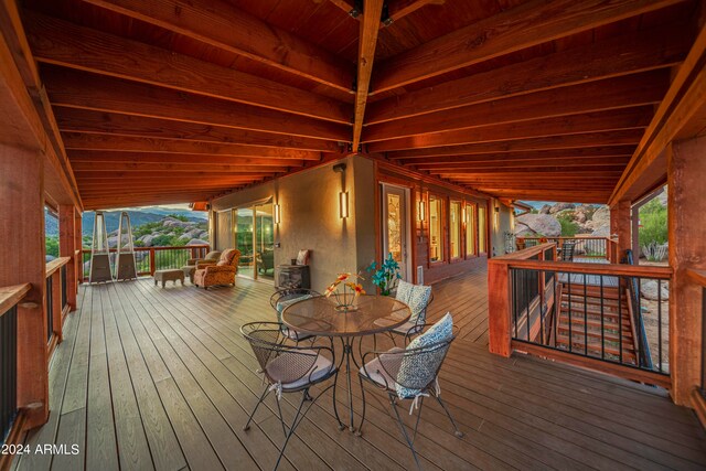 wooden terrace featuring a mountain view