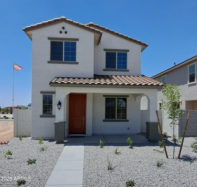 15599 S 180th Ln, Goodyear, AZ 85338 - mediterranean / spanish home with a tile roof, stucco siding, and covered porch