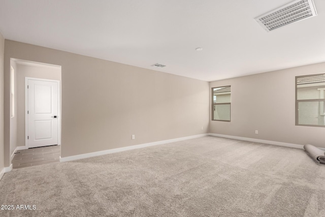 15599 S 180th Ln, Goodyear, AZ 85338 - empty room featuring light colored carpet and baseboards