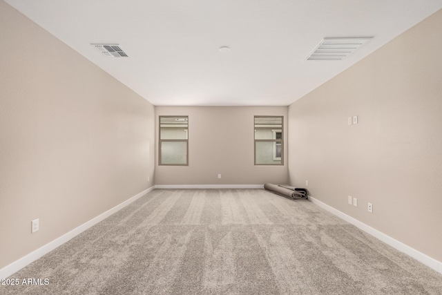 15599 S 180th Ln, Goodyear, AZ 85338 - empty room featuring carpet flooring and baseboards