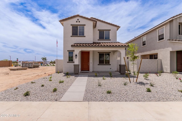 15599 S 180th Ln, Goodyear, AZ 85338 - mediterranean / spanish-style house with a tiled roof, stucco siding, and a porch