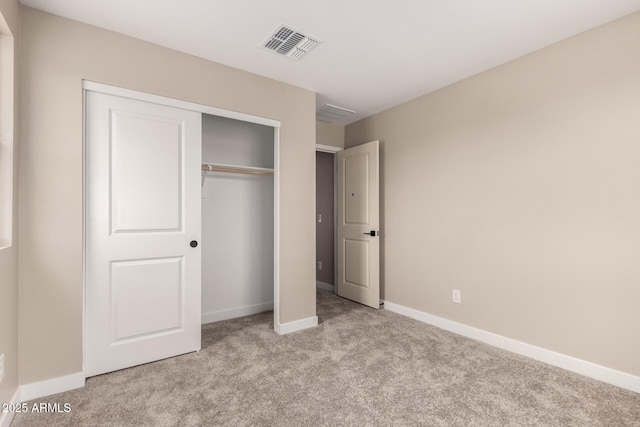 15599 S 180th Ln, Goodyear, AZ 85338 - unfurnished bedroom with carpet floors, a closet, and baseboards