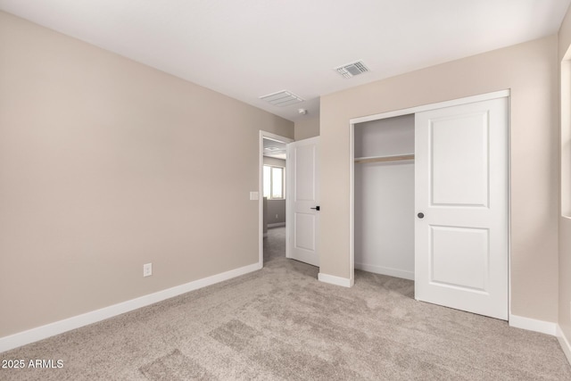 15599 S 180th Ln, Goodyear, AZ 85338 - unfurnished bedroom featuring carpet flooring, baseboards, and a closet