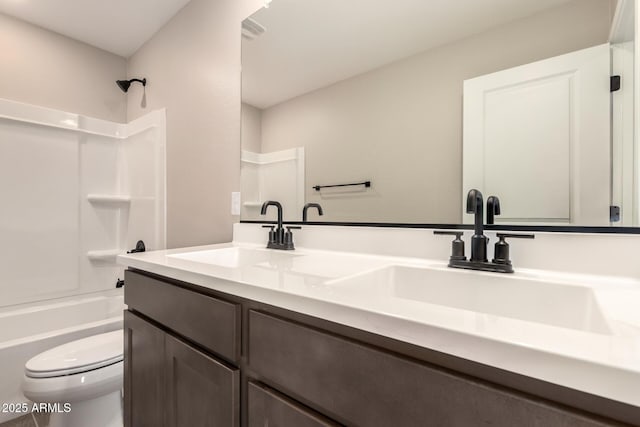 15599 S 180th Ln, Goodyear, AZ 85338 - bathroom featuring double vanity, toilet, and shower / tub combination