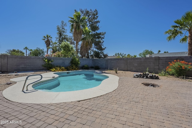 4025 E Surrey Ave, Phoenix, AZ 85032 - view of swimming pool featuring a fenced backyard and a patio
