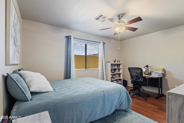 3534 N 106th Ln, Avondale, AZ 85392 - bedroom with wood finished floors and ceiling fan