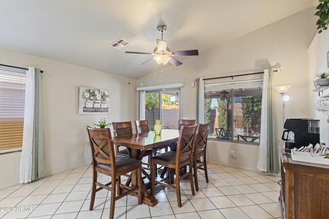 3534 N 106th Ln, Avondale, AZ 85392 - dining area featuring vaulted ceiling, ceiling fan, and light tile patterned floors