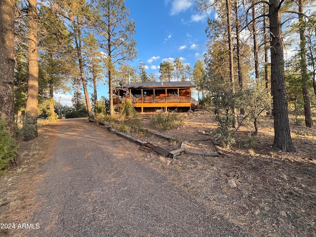 view of front of house featuring a wooden deck