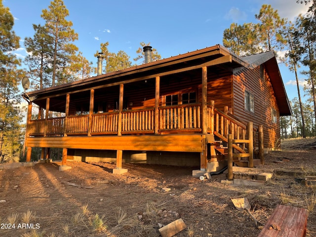 view of front of house featuring a wooden deck