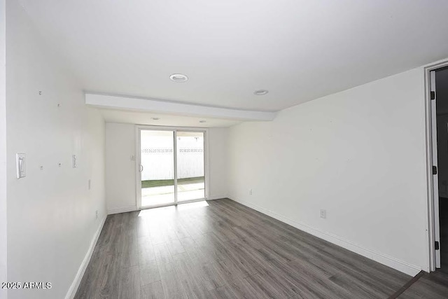 empty room featuring dark hardwood / wood-style floors