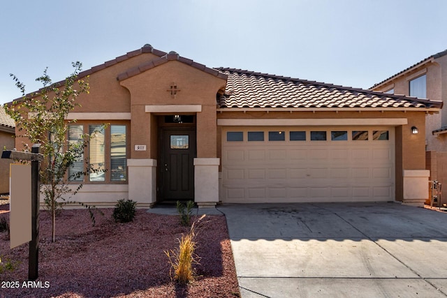 view of front of property featuring a garage