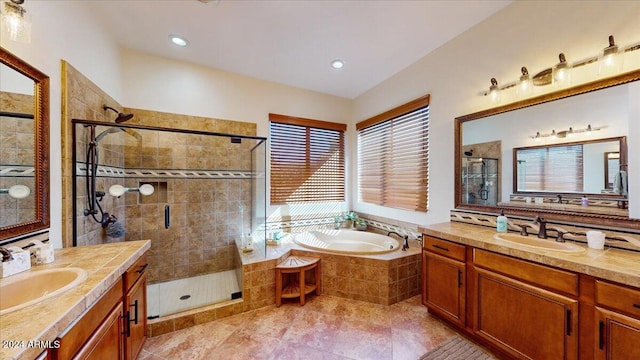 bathroom featuring vanity, separate shower and tub, and tile patterned flooring