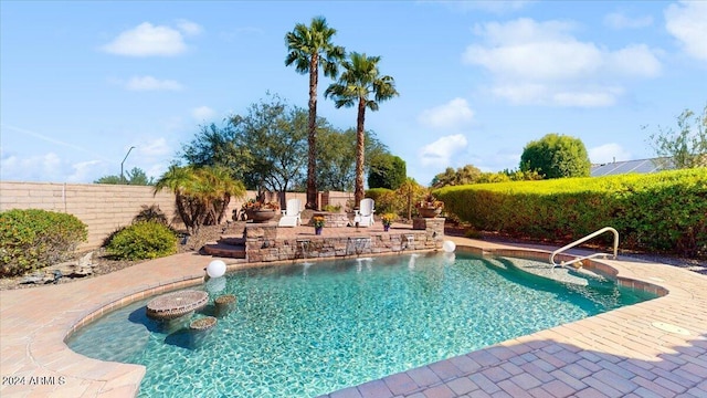 view of swimming pool with a patio