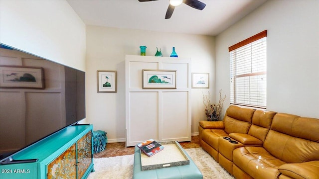 living room featuring ceiling fan