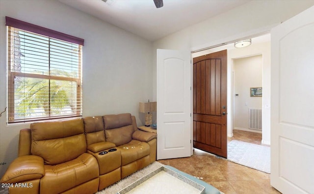 living room featuring light tile patterned flooring