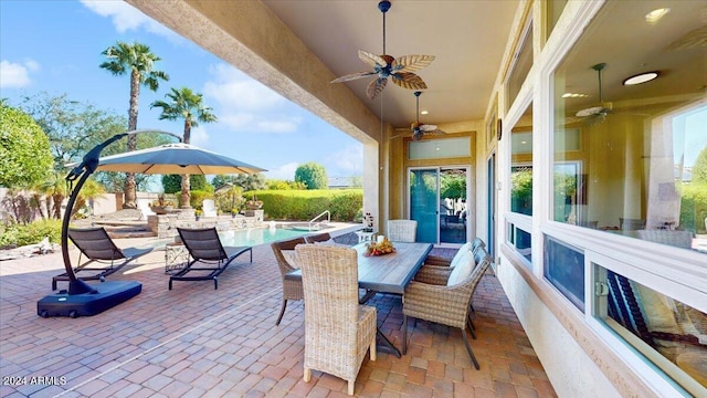 view of patio / terrace featuring ceiling fan