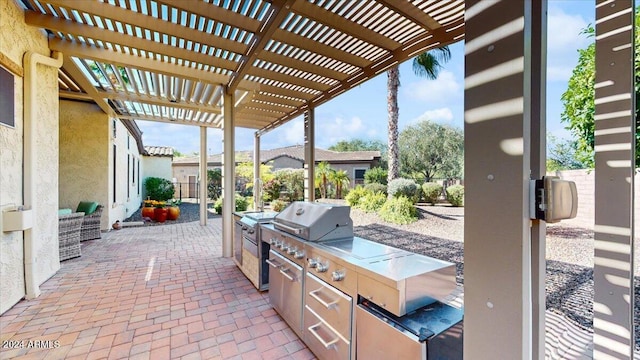 view of patio / terrace with an outdoor kitchen and a pergola