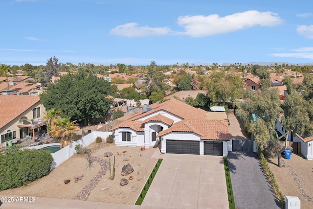 birds eye view of property with a residential view