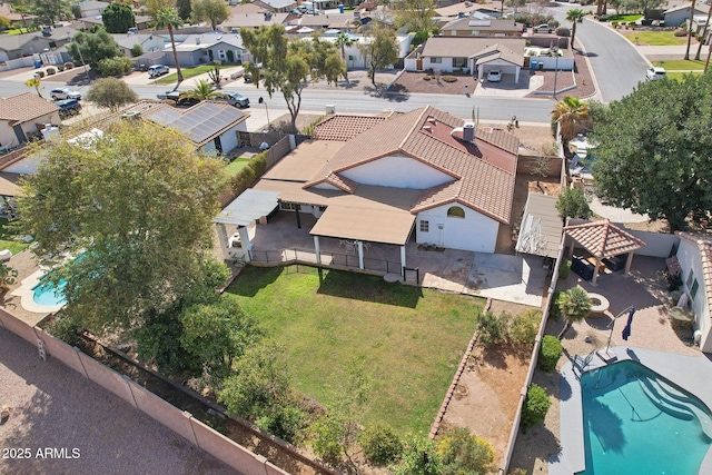 birds eye view of property with a residential view