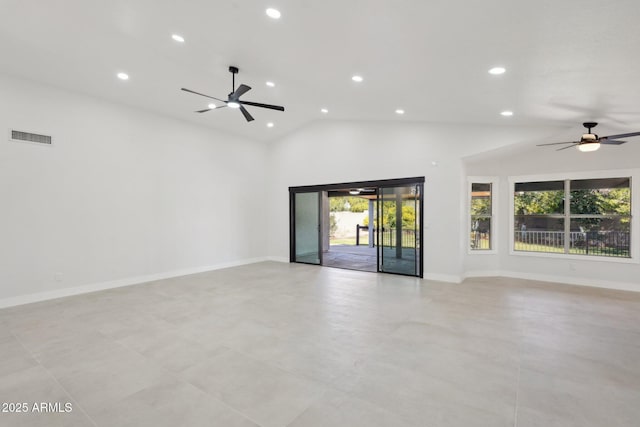 spare room featuring baseboards, visible vents, vaulted ceiling, and recessed lighting