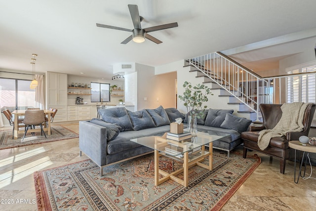 living room featuring ceiling fan