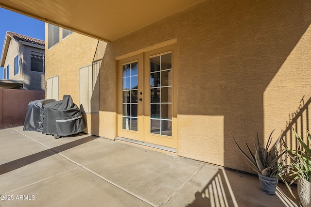 view of patio featuring french doors