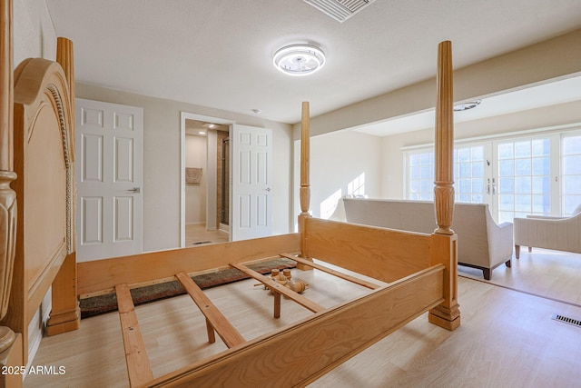 bedroom with light hardwood / wood-style flooring