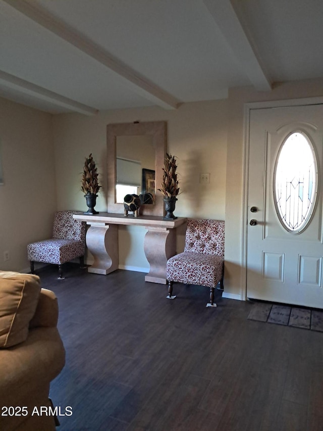 foyer entrance featuring wood-type flooring and beam ceiling