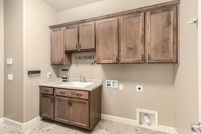 laundry area featuring cabinet space, washer hookup, hookup for an electric dryer, baseboards, and hookup for a gas dryer