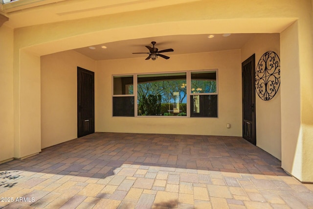 view of patio / terrace featuring a ceiling fan