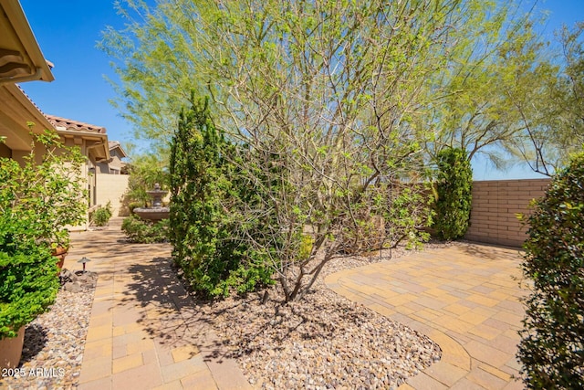 view of patio with fence