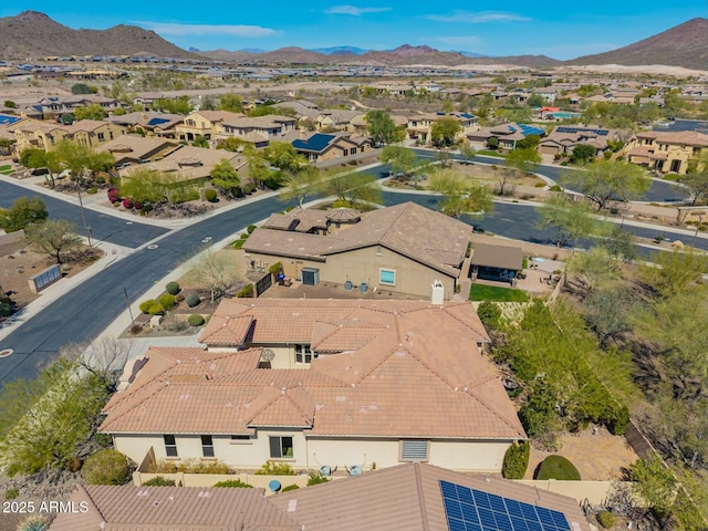 aerial perspective of suburban area with mountains
