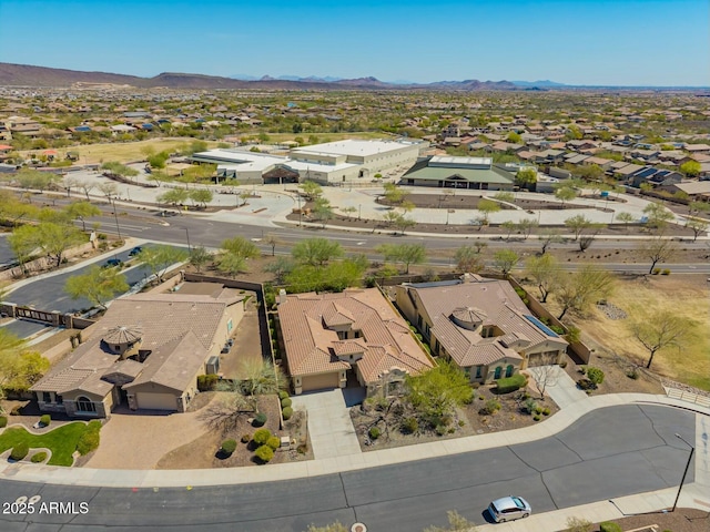 aerial perspective of suburban area with a mountainous background