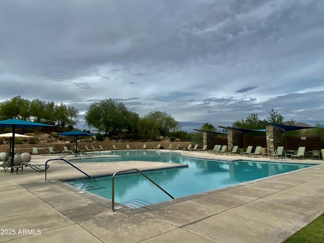 community pool featuring a patio
