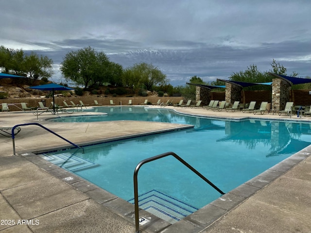 community pool featuring a patio