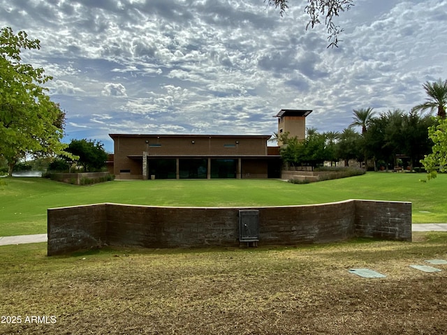 view of community with a yard