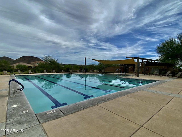 community pool featuring a patio