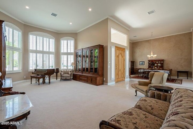 living room featuring visible vents and crown molding