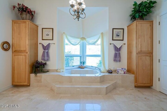 full bathroom with an inviting chandelier and a garden tub