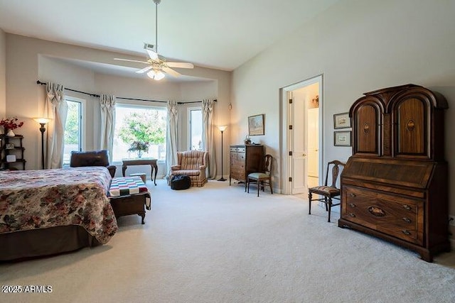 bedroom with a ceiling fan, visible vents, carpet floors, and high vaulted ceiling