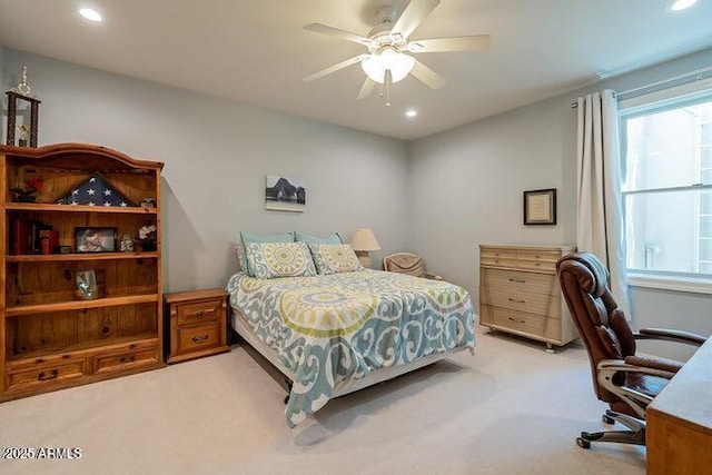 bedroom with recessed lighting, light colored carpet, and ceiling fan