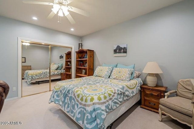 carpeted bedroom with recessed lighting, a closet, lofted ceiling, and ceiling fan