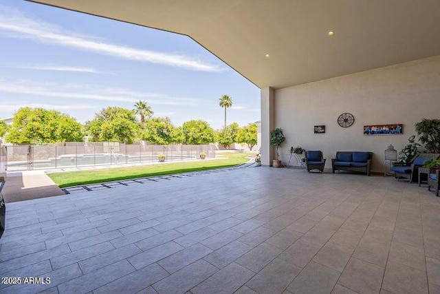 view of patio / terrace with fence