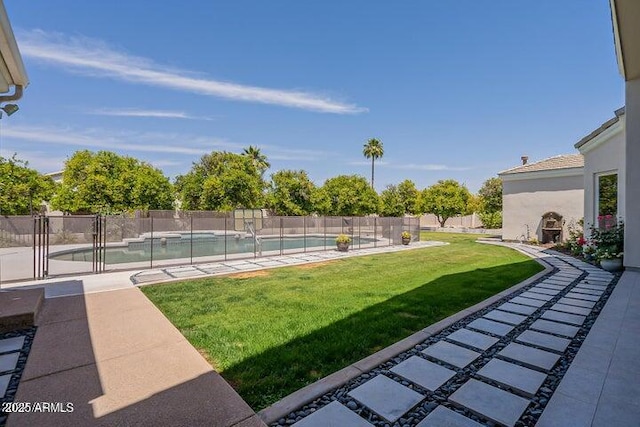 view of yard with a fenced in pool, a patio, and fence