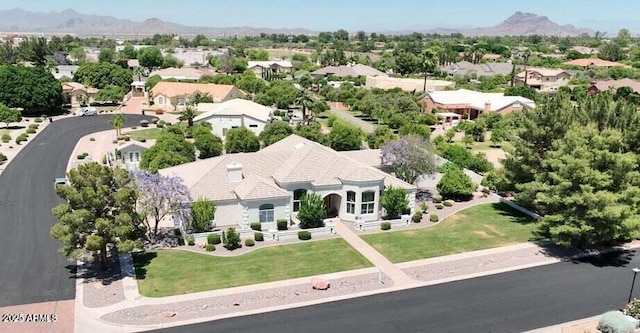 drone / aerial view with a residential view and a mountain view